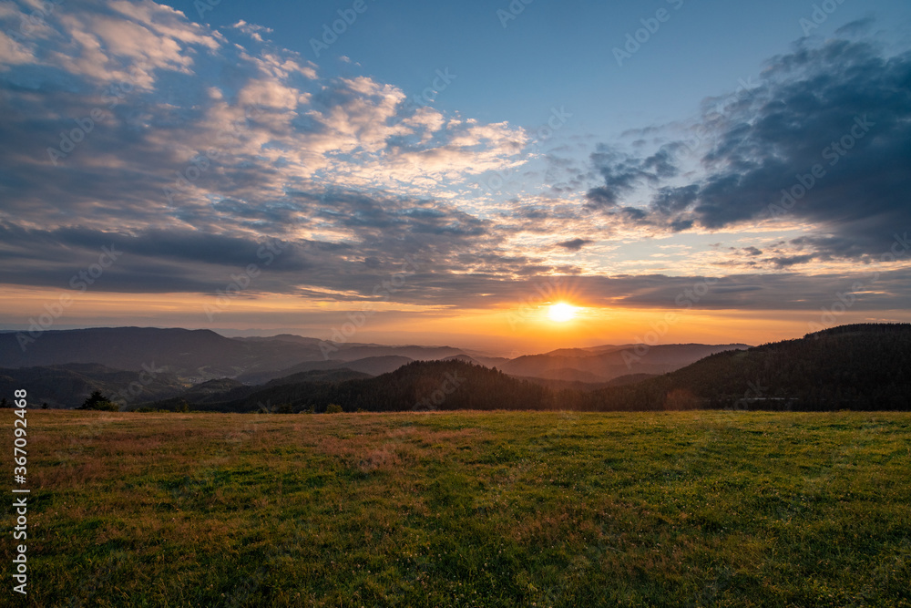 A sunset viewed from a mountain in the national park Black Forest in Germany, near Oppenau / Freudenstadt / Kniebis
