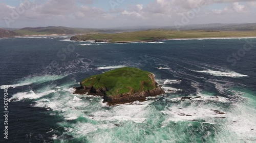 Aerial of Glashedy Island , an uninhabitated island west of Trawbreaga Bay - Donegal, Ireland photo