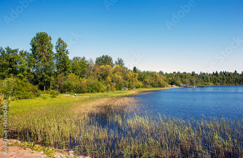 View of the continental coast of Tervu Bay, from the bridge to Koyonsaari Island. Ladoga lake. Karelia. Russia photo