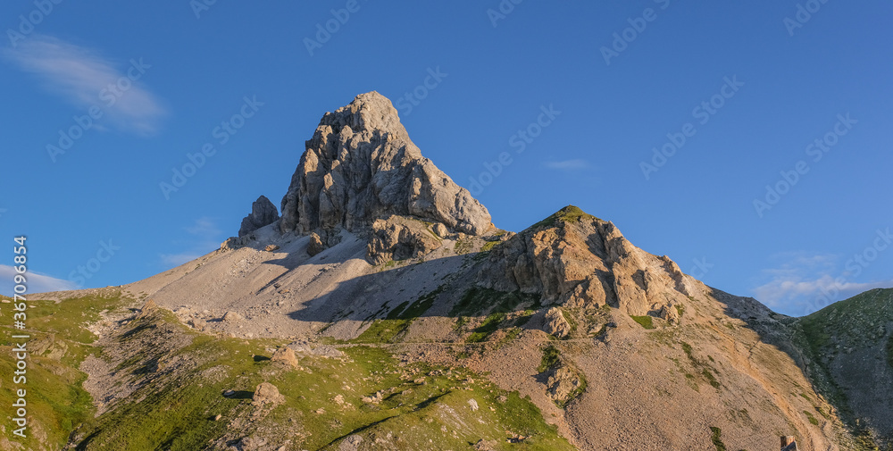 Early [sunny] morning  view of Grosse Kinigat mountain and Hintersattel pass as seen from Filmoor refuge, Carnic Highroute Trek, Carnic Alps, East Tirol, Austria.