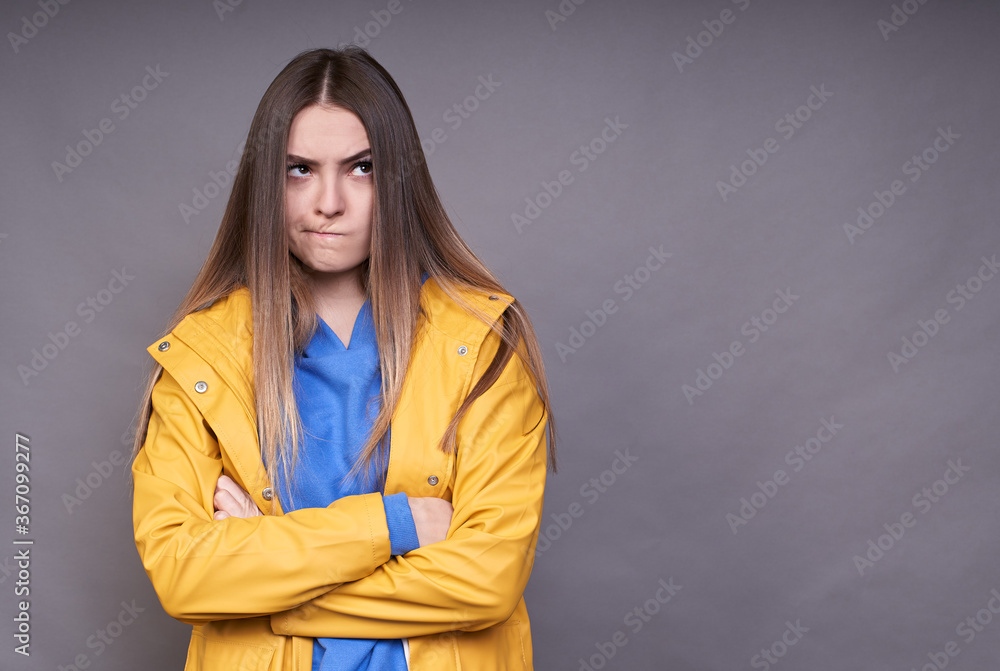 Sweet angry blonde girl has something to think about. Sweet angry blonde girl has something to think about.