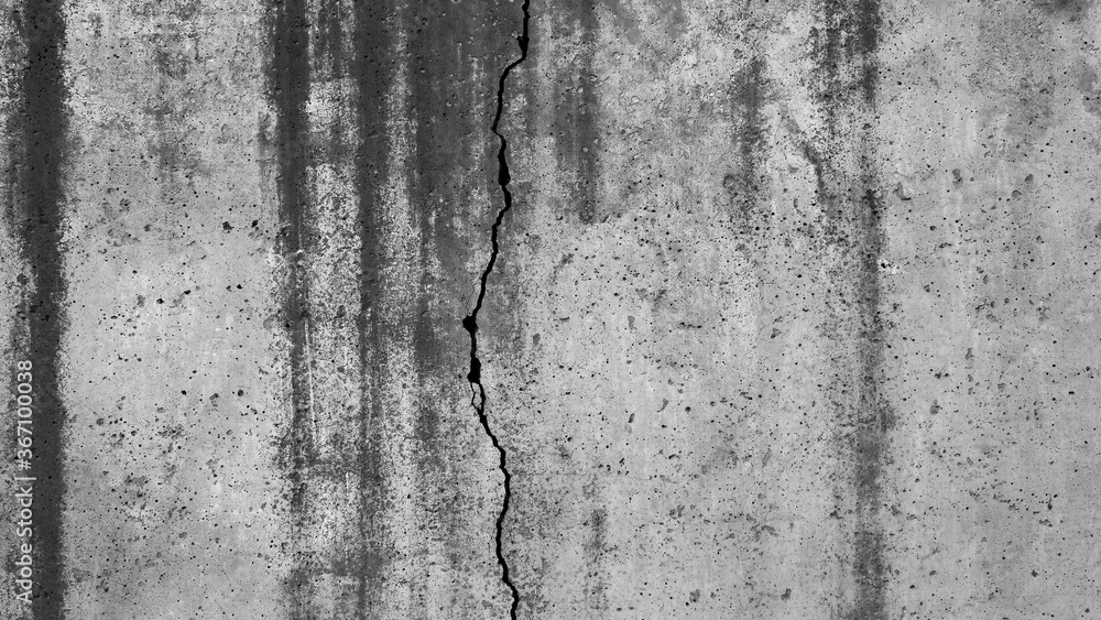 Fototapeta premium Building wall concrete surface. Crack. Background image for web design. 