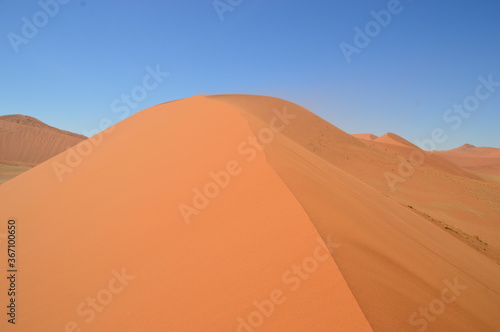 The red sand dunes of Sossusvlei in the Namib Desert, Namibia