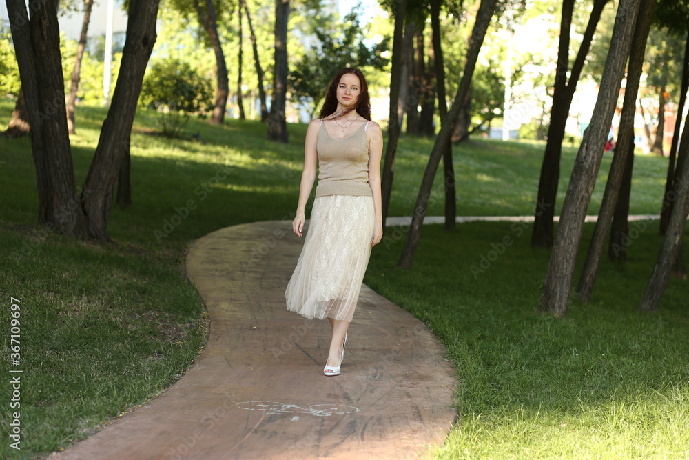 Young woman portrait in the park Young woman portrait in the park