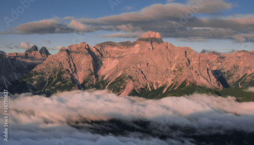 Outstanding early morning view of the Sesto Dolomites in Italy as seen from Sillianer refuge on the Carnic Alps ridge on the Austrian Italian border  Carnic Highroute trek  South Tirol  Austria.