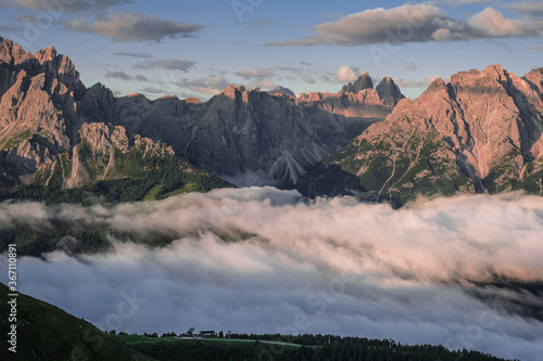 Outstanding early morning view of the Sesto Dolomites in Italy as seen from Sillianer refuge on the Carnic Alps ridge on the Austrian Italian border  Carnic Highroute trek  South Tirol  Austria.