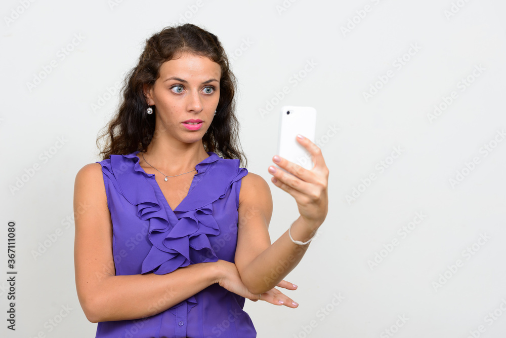 Portrait of young beautiful businesswoman with curly hair Portrait of young beautiful businesswoman with curly hair