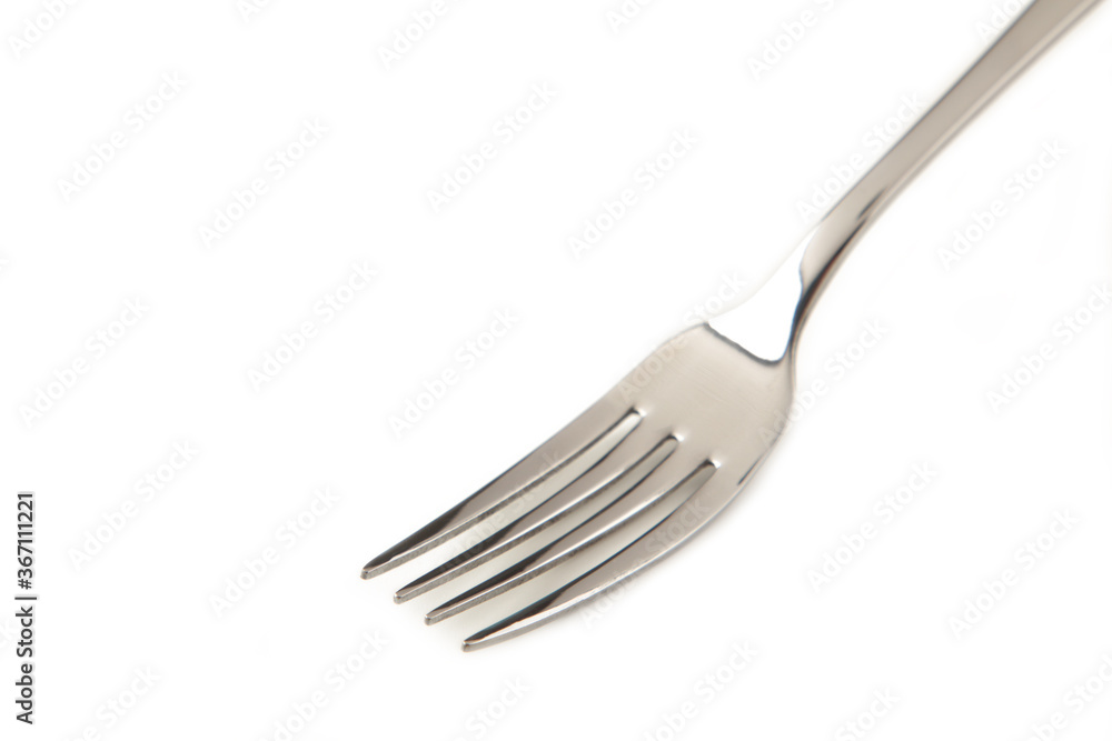Silver fork isolated on white background, close up Silver fork isolated on white background, close up