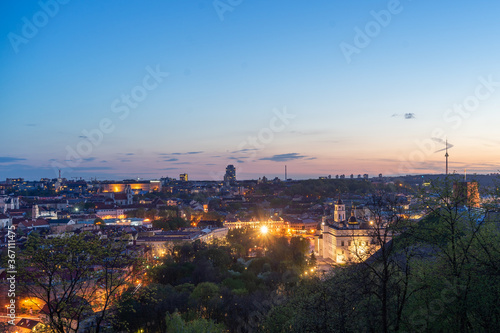 April 27, 2018 Vilnius, Lithuania. View of the old city of Vilnius from Three Cross Mountain at night.