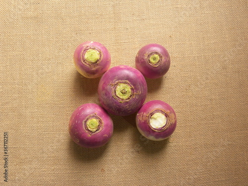 Purple color ripe whole Turnip roots photo