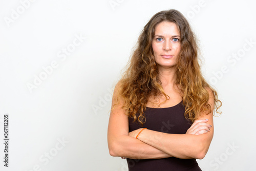 Portrait of young beautiful woman with curly blond hair © Ranta Images