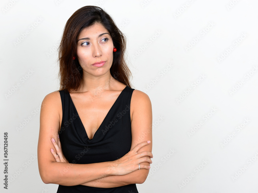 Portrait of stressed young woman thinking with arms crossed Portrait of stressed young woman thinking with arms crossed