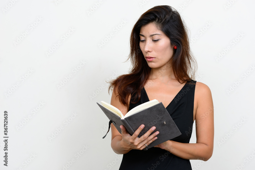 Portrait of young beautiful woman reading book Portrait of young beautiful woman reading book