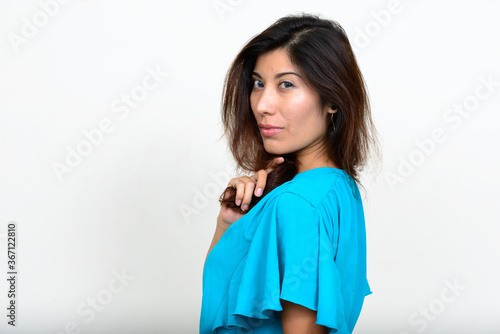 Portrait of young beautiful businesswoman looking at camera © Ranta Images