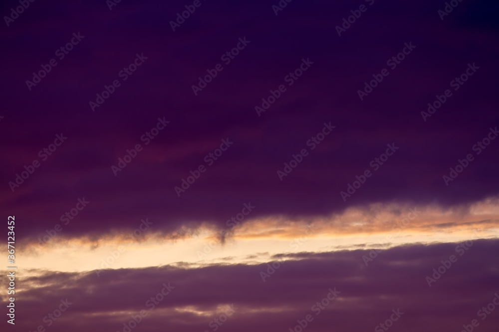 Dark purple clouds. The lines of the sky. Natural background.