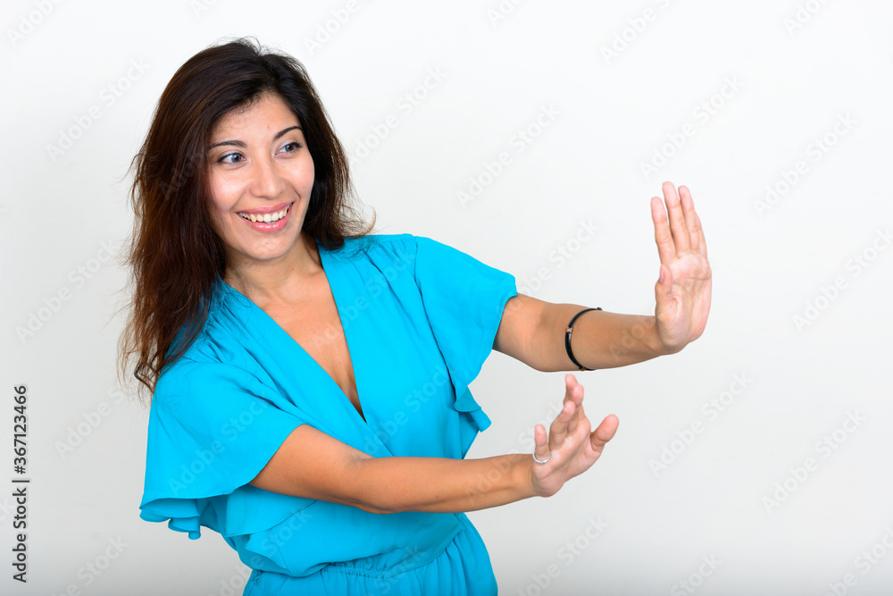 Portrait of happy young beautiful businesswoman with stop gesture Portrait of happy young beautiful businesswoman with stop gesture