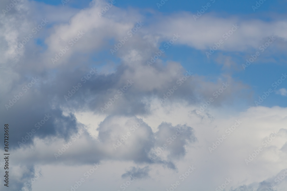 Clouds. Pieces of blue sky. Natural background.