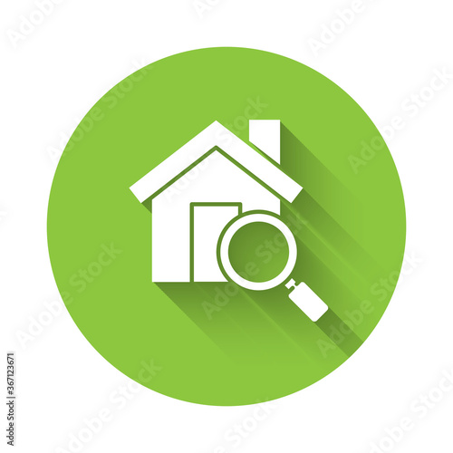 White Search house icon isolated with long shadow. Real estate symbol of a house under magnifying glass. Green circle button. Vector Illustration.