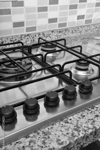 Принти на полотні Modern clean kitchen and stainless steel chrome built-in gas oven