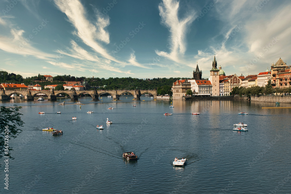 View of Charles Bridge and the river in Prague in summer