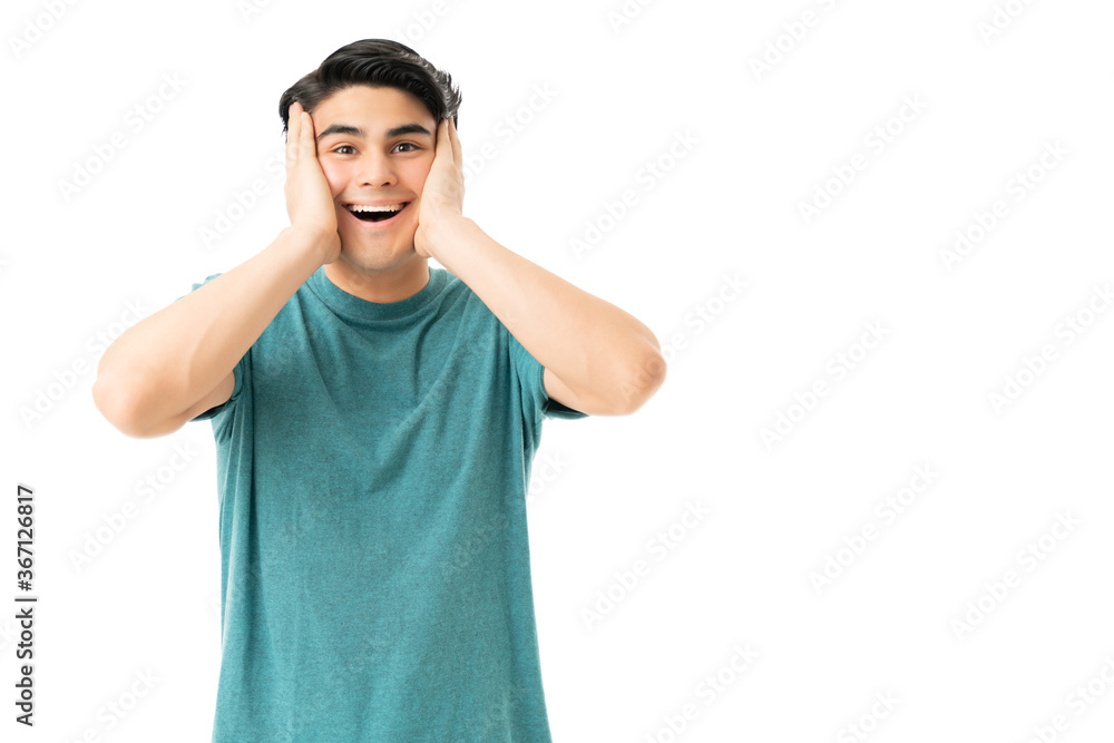 Good Looking Surprised Man With Head In Hands Good Looking Surprised Man With Head In Hands