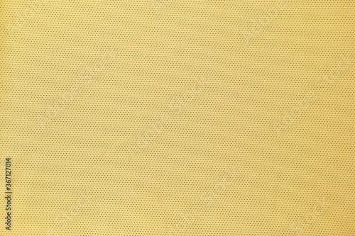 Yellow fabric with dot pattern background, blank yellow background