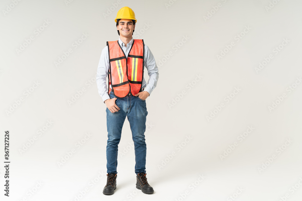 Confident Engineer Standing With Hand In Pocket Confident Engineer Standing With Hand In Pocket