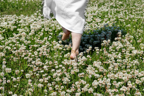 young woman in a field of flowers