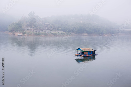Wallpaper Mural Landscape of a raft house on the river with misty atmosphere in morning time at Sangkhaburi the longest wooden bridge at Kanchanaburi province Thailand  Torontodigital.ca