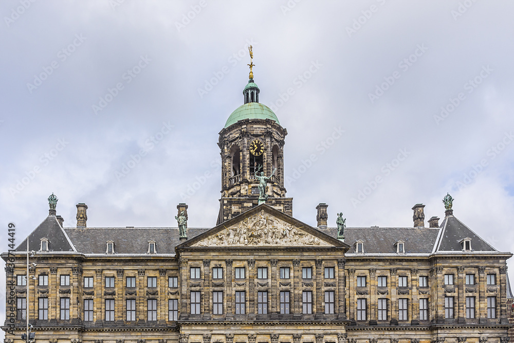 Architectural fragments of Royal Palace building (Koninklijk Paleis) at the Dam Square in Amsterdam, Netherlands. Classicism style Palace built as a city hall during Dutch Golden Age (1648 - 1655).