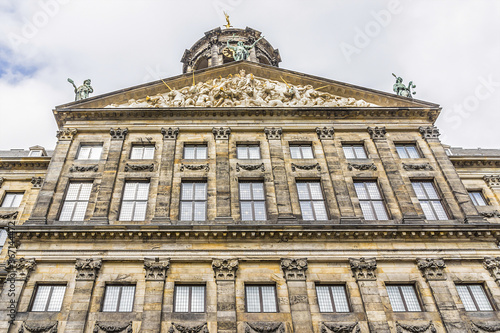 Architectural fragments of Royal Palace building (Koninklijk Paleis) at the Dam Square in Amsterdam, Netherlands. Classicism style Palace built as a city hall during Dutch Golden Age (1648 - 1655). © dbrnjhrj