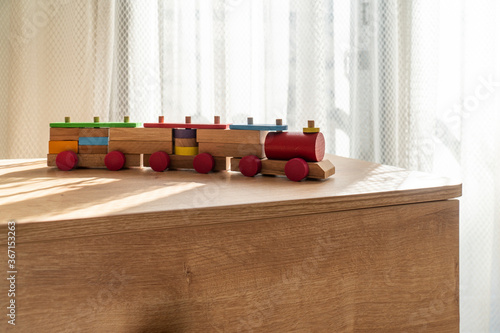 toy train on a wooden floor