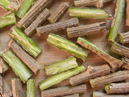 Diced cut Giloy or Tinospora cordifolia stems photo