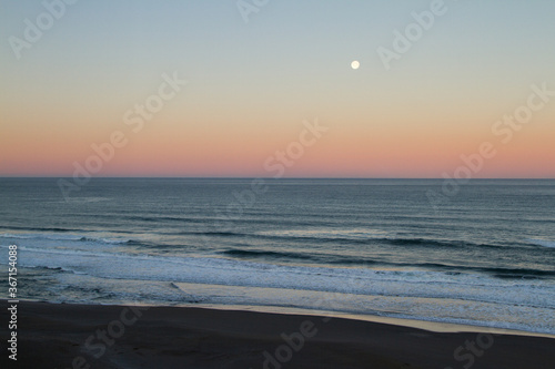 Moon setting on the pacific coast
