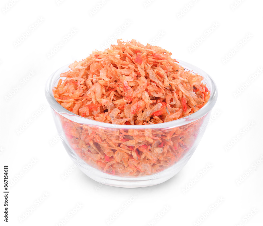 Dried small shrimp in glass bowl isolated on white background. Dried small shrimp in glass bowl isolated on white background.