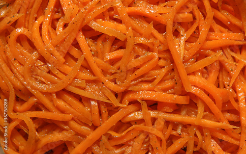 Pickled, chopped carrots with spices.