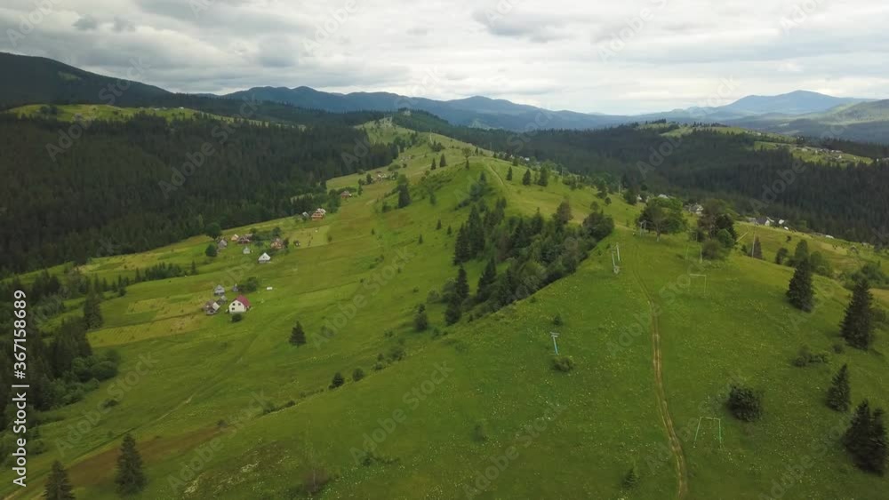 Drone flight over the Ukrainian Carpathians in summer. Fascinating landscapes in the mountains. Immovable nature Drone flight over the Ukrainian Carpathians in summer. Fascinating landscapes in the mountains. Immovable nature