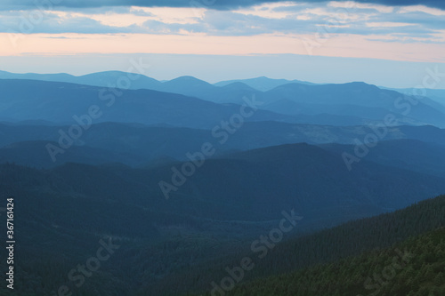 Sunset in the cloudy mountains of the Carpathians