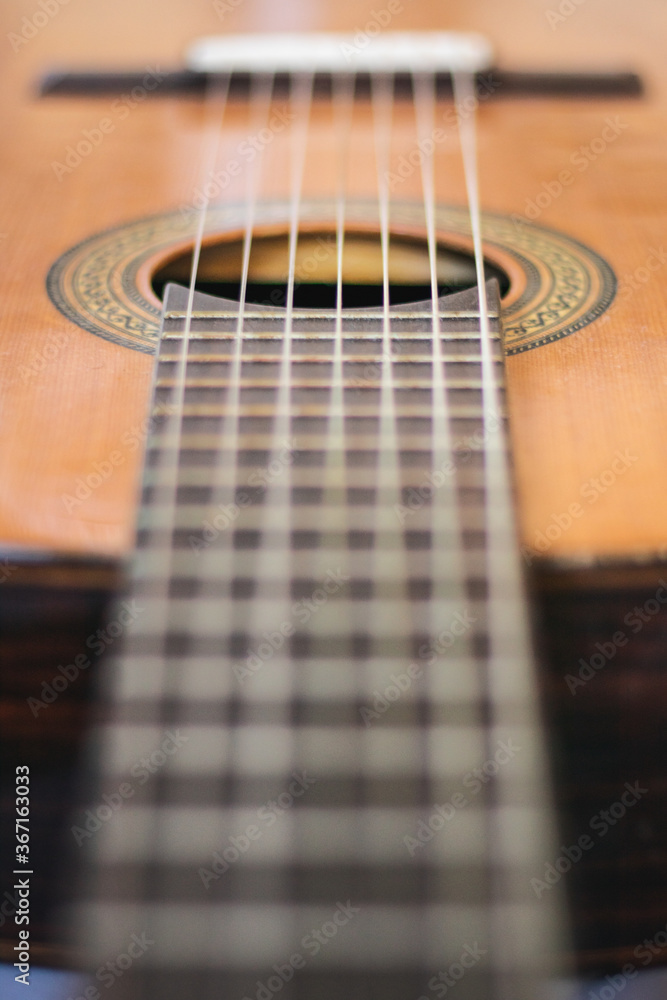 Obraz premium acoustic guitar close up seven strings