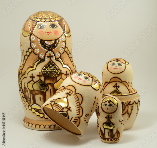 traditional Russian nesting dolls on white photo