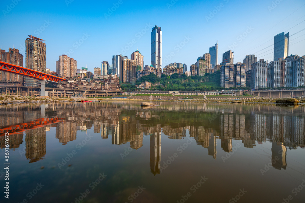 Chongqing, China cityscape at the Jialing River and Qianximen Bridge