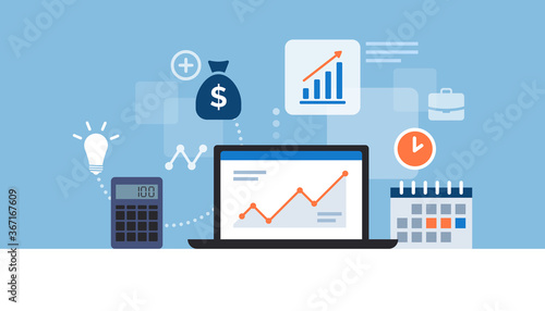 Business desktop with laptop and financial app
