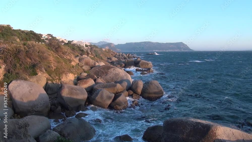 Summer day video of spectacular Simon's Town Millers Point harbour, lagoon and ocean beach. Simon's Town is Cape Town residential suburb on False Bay of Cape Peninsula, Western Cape, South Africa Summer day video of spectacular Simon's Town Millers Point harbour, lagoon and ocean beach. Simon's Town is Cape Town residential suburb on False Bay of Cape Peninsula, Western Cape, South Africa