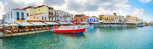 Panorama of Rethymno Venetian port with small cafes and bars, Crete, Greece photo