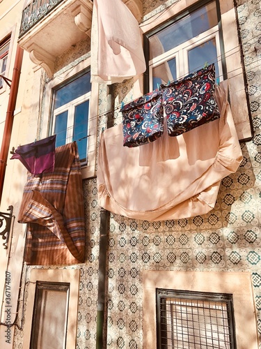 colorful laundry hanging in lisbon