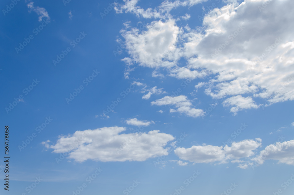 gray clouds against blue sky