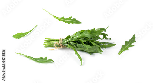 Green fresh rucola leaves isolated on white background. Rocket.