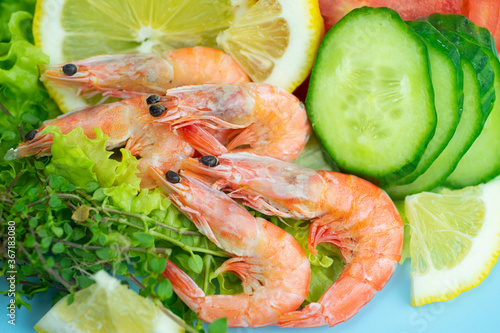 Fototapeta Naklejka Na Ścianę i Meble -  Shrimp, vegetable slices and greens for shrimp salad