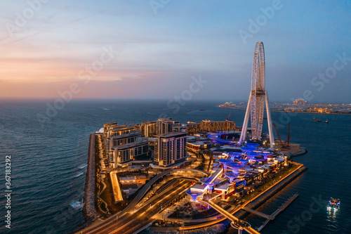 Photography Amazing sunset view of Dubai Eye, the soon to be world's largest ferris wheel lo