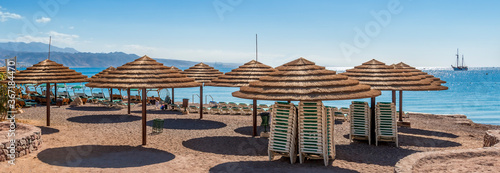 Relaxing sunny beach for all the family in Eilat - famous tourist resort and recreation city in Israel